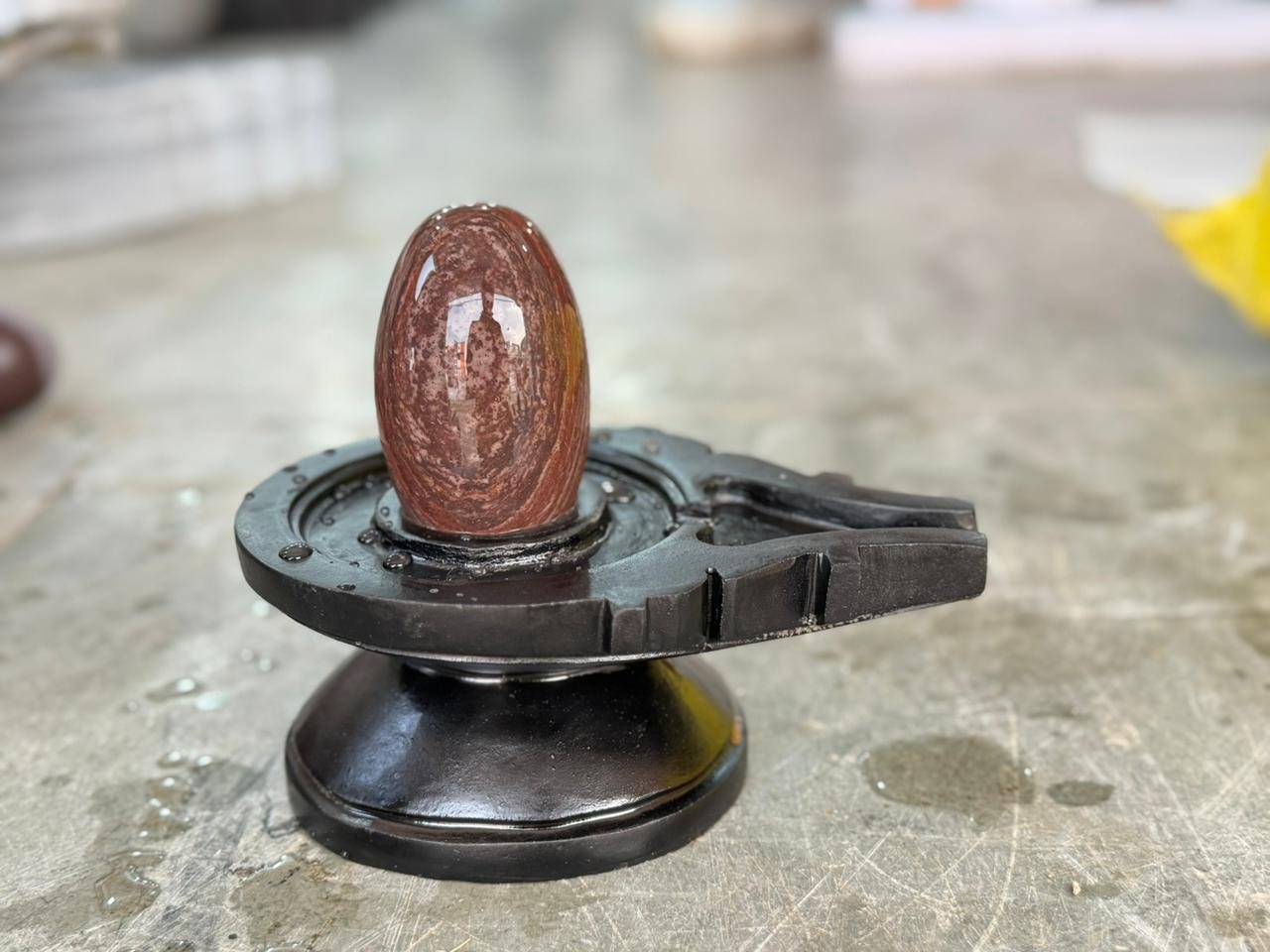 Narmadeshwar Shivling with Black Yoni Base (Natural Earth-Tone Stone)